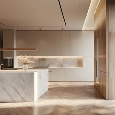 an empty kitchen with marble counter tops and wooden flooring on the walls, along with white cabinetry