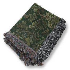 a green and black throw with fringes on it's ends, in front of a white background