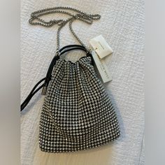 Madison West Los Angeles Handbag - Brand New Never Worn Cute Bag. Evening Crossbody Bucket Bag With Silver-tone Hardware, Silver Crossbody Bag For Party, Luxury Silver Bucket Bag For Party, Chic Party Bucket Bag With Silver-tone Hardware, Party Shoulder Bag With Silver-tone Hardware, Bucket Shape, Party Bucket Shoulder Bag With Silver-tone Hardware, Luxury Silver Bucket Bag For Evening, Elegant Silver Bucket Bag For Evening, Party Bucket Bag With Silver-tone Hardware