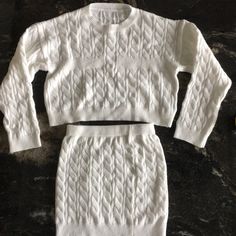 Never Been Worn! No Tags But It Is Brand New. Runs Alittle Smaller Because It’s Shein. Long Sleeved Crop Sweater And Matching Skirt. Perfect Condition. Very Cute Set! Casual White Knit Sets, Fitted Knit Casual Sets, Cozy Fitted Sets For Winter, Cozy Fitted Winter Sets, White Crop Sweater, Sweater And Skirt Set, Skirts Shein, Shein Skirts, Sweater And Skirt