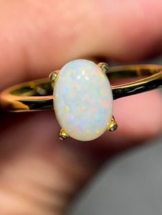 Australian opal set in gold plated 925 sterling silver ring Ring: made from gold plated 925 sterling silver Size 6.5 Stone: solid Australian opal mined from Coober Pedy 0.9 carats 8x6 mm Hallmarked Opal Ring, Hallmarked Opal Ring Jewelry, Classic Yellow Gold Opal Ring, Classic Opal Moonstone Ring As Gift, Ethiopian Opal Moonstone Ring In Yellow Gold For Gift, Yellow Gold Opal Ring Oval Cabochon For Gift, Yellow Gold Moonstone Ring With Ethiopian Opal For Gift, Classic Ethiopian Opal Gemstone Rings, Gold Opal Cabochon Promise Ring