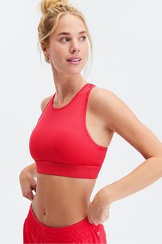 Trinity High Impact Sports Bra Fabletics red female Activewear >> Womens >> Sports Bras >> Sports Bra >> High Impact Knit regular Running/Training 4-Way Stretch/Breathable/Moisture-Wicking/Pockets/Removable Bra Cups Features innovative triple-pocket design Red High Stretch Sleeveless Sports Bra, Red Racerback Activewear For Training, Compressive Red Activewear, Functional Red Activewear For Running, Red Athleisure Sports Bra For Running, Red Sports Bra For Training, Red Stretch Activewear For Running, Red Athletic Fit Activewear For Sports, Red Casual Activewear For Sports