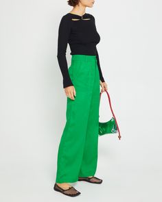 Product Details The Freda Pant's bright green hue is fun and fresh, while its high-waisted design and straight leg create a modern silhouette. Add this piece to your look for an instantly stylish upgrade. - Front button and zipper- Front pocket- Back pocket- Content: 30% Linen, 70% Rayon Style# C23WPA00225 Fit Notes - Model wearing a size XS - Model measurements: 5'8' Height / 32'' Bust / 23.5'' Waist / 34'' Hips- Garment measurements: Size Length Waist Hips XS 104.78 68.58 93.98 S 105.73 72.39 Green Cotton High Waist Wide Leg Pants, High Waist Green Cotton Wide Leg Pants, Green High Waist Wide Leg Cotton Pants, Green High Waist Cargo Pants For Summer, Trendy Green Wide Leg Bottoms, Green High Waist Wide Leg Pants For Work, Green High Waist Wide Leg Pants With Pockets, Green Straight Leg Wide Pants For Summer, High Waist Green Wide Leg Cotton Pants