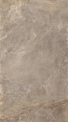 an image of a tile floor with grey and brown colors