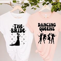 two t - shirts that say the bride and dancing queens are hanging on a tree