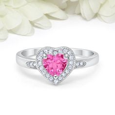 Make a purchase of $50 or more and receive 10% Off Use Coupon Code "JOON10OFF"Metal: Sterling SilverMetal Purity: .925 Center Stone Size: 5.5mmRing Height From South to North: 8mmBand Width: 2mmGemstone: Simulated Pink Topaz, Simulated Diamond Gemstone Color: Pink, Colorless  Gemstone Clarity: Flawless Design: HaloPlating: Gift Box Included Don't know your ring size?Here you can find a link to a conversion table of all ring sizes of all country's:(copy & paste into your browser)http://pics.b Pink Heart Engagement Rings, Morganite Wedding Band, Heart Promise Rings, Conversion Table, Heart Engagement Rings, Ring Heart, Barbie Stuff, Pink Topaz, Band Engagement Ring