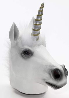 a white unicorn's head with a gold horn