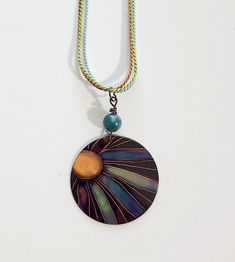 "This necklace  is made with copper and fire only!  I make it by painting patterns onto copper with a micro torch, and as the copper heats and cools it turns different colors naturally!  The copper circle 1 1/2\" and is shown on colorful silk cord which is adjustable.  Definitely a one of a kind piece!   These are custom made per order, so please remember - I have little control of what colors happen - your piece may not look exactly like the picture - it may be similar, it may be more vibrant, it may be a different color palette - but I assure you it will be cool!" Flame Painting, Painted Pendants, 7th Anniversary Gifts, Copper Style, Painted Jewelry, Unusual Jewelry, Silk Cord, Copper Necklace, Circle Necklace