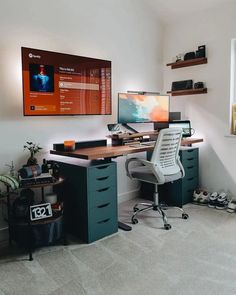 a computer desk with two monitors on it