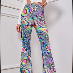 Multicolor Flare Leg Rave Pants Size Xs Never Worn And In Excellent Condition Should Fit Sizes Xs - S Super Vibrant And Perfect For Festivals Neon Rave Pants, Multicolor High Waist Pants With Elastic Waistband, Multicolor High-waisted Pants With Elastic Waistband, Multicolor Flare Summer Pants, Multicolor Flare Pants For Summer, Multicolor Full Length Summer Bottoms, Trendy Multicolor Full Length Bottoms, Casual Multicolor High Waist Wide Leg Pants, Casual Multicolor Fitted Wide Leg Pants