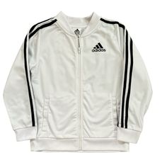 New Without Tags Adidas Youth Unisex White Black Full Zip Tricot Track Jacket Size: Medium Youth (Unisex) Color: White And Black Track Jacket Tricot Unisex Sporty Adidas 3 Stripe Jacket Full Zip Closure Hand Pockets Long Sleeves Cuffed Sleeves Adidas Logo On Left Chest Three Stripe Detailing Athletic Athleisure Activewear Sports Soccer 100% Polyester Machine Wash Approximate Measurements (Laid Flat): Pit To Pit: 16” Sleeve Length: 19" Length: 20.5" Adidas Clothes, Sporty Jacket, Sports Soccer, Adidas Track Jacket, Adidas Outfit, Striped Jacket, Adidas Sport, Sports Jacket, White Adidas