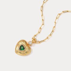 Look no further than this dazzling Emerald Mini Heart Necklace! This gorgeous piece is perfect if you're looking to add a little sparkle to your look. Show-stoppingly stunning, this necklace will make sure you look dazzling wherever you go! 💚 DETAILS Plating: 18K Gold Materials:   18K Gold on Brass, Glass, Gemstone Length:  16.93 "(43cm) + Extender: 3.15"(8cm) Pendant   Size :  1.22"*0.83"(3.1cm*2.1cm) Weight:  15.6 g Heart-shaped May Birthstone Jewelry As A Gift For Her, Heart-shaped May Birthstone Jewelry Gift For Her, Wedding Necklace With Heart Charm And Cubic Zirconia, Wedding Cubic Zirconia Necklace With Heart Charm, Gold Heart Pendant Rhinestone Necklace Gift, Elegant Heart Pendant Locket Necklace With Adjustable Chain, Heart Pendant Cubic Zirconia Necklace For Party, Heart-shaped Cubic Zirconia Necklaces For Party, Valentine's Day Gold Rhinestone Necklace