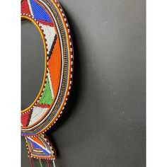 Vintage African Masai Beaded Traditional Wedding Necklace Artifact Wall Decor from Kenya. One of a kind piece artifact , expertly hand beaded by the skillful Maasai people. This Bold and colorful necklace is worn among the Masai people of Kenya during weddings and special festivals. Colorful beadwork, each color bead represents a different aspect of the Maasai culture: Bravery, (red), Energy (blue), Purity (white), Nourishment (green), Warmth & Generosity (orange), Cycle of Life (yellow ), and B Traditional Handwoven Beaded Necklaces For Festivals, Traditional Handwoven Beads For Festivals, Traditional Handwoven Beads For Jewelry Making, Traditional Handmade Beaded Necklaces For Ceremonies, Traditional Handmade Multicolor Beads, Multicolor Traditional Pattern Necklace As Gift, Traditional Multicolor Beaded Necklaces As Gift, Traditional Multicolor Necklace With Traditional Patterns, Handmade Multicolor Jewelry For Traditional Ceremonies