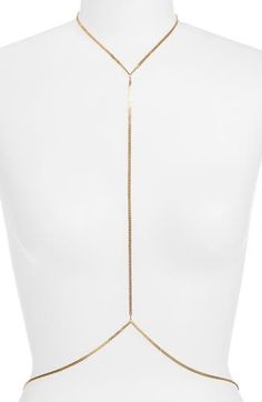 Completely wrap yourself in shine with this sleek body chain. 18k-gold plate Made in the USA of imported materials Minimalist Gold Body Chain, Elegant Gold Body Chain With Chain Strap, Minimalist Gold Body Jewelry For Party, Elegant Gold Body Chain With Delicate Chain, Chic Gold Lariat Necklace With Gold Chain, Minimalist Gold Clavicle Body Chain, Adjustable Delicate Gold Body Chain, Gold Lariat Body Jewelry As Gift, Chic Gold Metal Body Chain