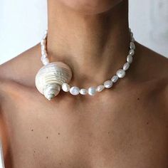 Elevate your style with our Handmade Natural Shell and Freshwater Pearl Necklace! This stunning handmade statement piece is perfect for adding a touch of summer to any outfit. Made from genuine natural shells, it's a unique accessory that will surely turn heads. Upgrade your summer look with our must-have necklace today! Material: freshwhater pearls and shells Metal type: Stainless Steel Adjustable Length Seashell Necklace, Freshwater Pearl Necklace, Wedding Jewellery Necklace, Choker Collar, Bohemian Fashion, Freshwater Pearl Necklaces, Free Spirited, Summer Look, Fashion Accessories Jewelry