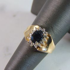 For Sale Is This Lovely Vintage 14k Yellow Gold Diamond & Sapphire Ring With A Total Of About .14cts Of Diamonds. The Total Weight Is 3.7g, And Is A Size 6.0. Any Questions Please Dont Hesitate To Ask. Be Sure To Check Out Some Of Our Other Great Items Up For Sale. Thank You. Yellow Gold Cluster Sapphire Ring With Brilliant Cut, Yellow Gold Sapphire Cluster Ring With Brilliant Cut, Cluster Sapphire Ring In Yellow Gold, Cluster Yellow Gold Sapphire Ring, Yellow Gold Cluster Sapphire Ring, Yellow Gold Sapphire Cluster Ring, Yellow Gold Cluster Sapphire Ring With Center Stone, Yellow Gold Sapphire Cluster Ring With Center Stone, Classic Sapphire Ring Stamped 14k