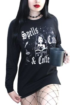 Spells Cats & Coffee Boyfriend Fit Tee Does a witch need anything more? Style this with teeny shorts under or with leggings & combat boots for a casually dark look. Printed on a long sleeve mens fit jersey tee. 100% Cotton Jersey Model 34" bust Wearing S/M Brand: Demi Loon Sizing: For Reference Model 34" bust, 5'9" tall, wearing size S/M sku: SCC3-MLS-BLK Demi Loon alternative gothic clothing, demi loon dark pinup clothing, cute goth tees, witchy spells tees, cat mom tee, coffe t-shirt, Black Witchy Tops With Letter Print, Gothic Letter Print Tops For Fall, Gothic Cotton Tops For Fall, Cotton Gothic Tops For Fall, Fitted Long Sleeve Top With Cat Print, Witchy Cotton Tops With Letter Print, 90s Goth Outfits, Leggings And Combat Boots, Pinup Clothing