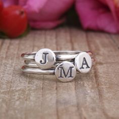 "Stack our initial bands to say whatever you want - Spell a name, wear an initial for each member of the family, or create a couple's ring with two initial bands stacked with a heart band in the middle. The possibilities are endless! **The base price of this listing is for one sterling silver initial ring with one initial/symbol per band. If you choose more rings, the price will increase. Rings available in all letters, the heart symbol, the cross symbol and the & sign** Want to add birthsto Adjustable Stackable Rings With Initials, Personalized Initial Open Ring, Personalized Adjustable Initial Open Ring, Personalized Adjustable Open Initial Ring, Adjustable Stackable Initial Open Ring, Adjustable Personalized Midi Rings, Adjustable Initials Stackable Rings For Everyday, Adjustable Stackable Initial Ring, Everyday Adjustable Stackable Rings With Initials