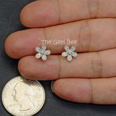 "Thank you for coming in! Extraordinary 14K solid white gold diamond flower Ear posts with backs! 0.15 carat total diamond weight,high quality F-G color, VS-SI clarity. It looks much much nicer in person! It is stamped with \"14k\" which is shown on the back. You'll get one pair per winning! SIZE: 8.6mm Weight: 1.45 gram (approx) MATERIAL: 14k Solid white gold, Diamond" Flower Shaped Diamond Earrings With Single Cut Diamonds, Flower-shaped Diamond Earrings With Single Cut Diamonds, Fine Jewelry Diamond Earrings In Flower Shape, Diamond White Flower-shaped Earrings With Diamond Accents, Diamond White Flower-shaped Diamond Earrings, Fine Jewelry Diamond Earrings With Flower Shape, Flower Shaped Diamond Earrings With Diamond Cut, Flower-shaped Cubic Zirconia Diamond Earrings With Accents, Flower-shaped Brilliant Cut Diamond Earrings