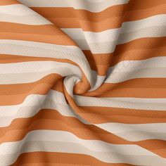 an orange and white striped fabric