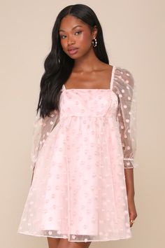 Your sweet personality will always shine in the Lulus Effervescent Charm Pink Organza Floral Babydoll Mini Dress! Airy woven organza features an adorable texture of applique-like floral details as it shapes three-quarter balloon sleeves with elastic at the cuffs and shoulders. Square neckline tops a seamed bodice with a high waist. Babydoll silhouette continues with a flaring skirt that finishes at a mini hem. Hidden zipper/clasp at back. Fit: This garment fits true to size. Length: Mid-thigh. S Feminine Organza Mini Dress, Pink Floral Applique Mini Dress For Spring, Spring Pink Mini Dress With Floral Applique, Spring Organza Mini Dress, Sheer Organza Mini Dress, Summer Puff Sleeve Organza Mini Dress, Summer Organza Mini Dress With Puff Sleeves, Spring Sheer Dress With Sweetheart Neckline, Pink Mini Dress With Sheer Sleeves For Spring