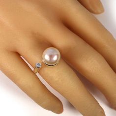 Pearl White Pearl Ring For Anniversary, Fine Jewelry Silver Pearl Ring, Pearl White Open Ring For Anniversary, Anniversary Pearl White Open Ring Pearl Ring, Anniversary Pearl Open Ring, Silver Pearl Open Ring, Open Ring Pearl Charm For Anniversary, Silver Ring With Pearl Charm For Wedding, Silver Open Ring With Pearl Drop