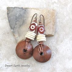 These Earrings Have An Earthy Boho Style With A Touch Of Tribal Flair And Feature Brown Wood Beads Wire Wrapped In Copper Wire Accented With African Agate Stones With An Etched Pattern. Slices Of Ostrich Egg Shell Beads Add A Nice Contrast. Brand New - Never Worn - Handmade By Me. Measurements: Total Length: 2-1/8” From Top Of Niobium (Hypoallergenic) Ear Wires And 3/4" At Widest Point. Boho Earrings Diy, African Trade Bead Jewelry, Copper Earrings Handmade, African Inspired Jewelry, Earth Jewelry, Neutral Earrings, Ostrich Egg, Handmade Boho Jewelry, Starburst Earrings