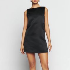 Reformation Sarena Dress In Black. Measurements: Bust (Pit To Pit)- 20 1/4” Waist- 20 1/2” Hips- 21 1/4” Length (Shoulder To Hem)- 33” (Measurements Taken With Garment Lying Flat) Condition: New With Tags Fabric: 100% Polyester I26-023 Black H-line Party Dress, Black Dress With Straight Neckline And Back Zipper, Black Sleeveless Dress With Straight Neckline, Chic Sleeveless H-line Dress For Evenings, Classic Sheath Mini Dress For Party, Black Satin Dress With Straight Neckline, Silk Mini Dress With Straight Neckline For Evening, Classic Black Silk Dress, Elegant Black Silk Sleeveless Dress