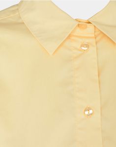 Classic oversized shirt in light yellow with button closure on the front. Elegant collar and wide edges around the wrist. The model measures 176 cm cm and wears size S 100% cotton SKU : S232251 Yellow Spread Collar Shirt For Work, Yellow Collared Shirt For Work, Collared Yellow Shirt For Work, Oversized Yellow Cotton Shirt, Yellow Workwear Tops With Button Cuffs, Yellow Tops With Button Cuffs For Work, Yellow Collared Cotton Blouse, Oversized Yellow Tops With Button Closure, Yellow Cotton Blouse With Button Closure