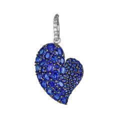 Approx. 7.40 carats Round and Oval Blue Sapphires Approx. 0.10 carats Round Diamonds Pendant is set in 18K White and Black Gold Chain sold separately Blue Pear-shaped Diamond Jewelry, Pear-shaped Blue Diamond Jewelry, Sapphire Heart Cut Gemstone Jewelry, Heart Cut Sapphire Gemstone Jewelry, Luxury Blue Jewelry For Valentine's Day, Fine Jewelry Sapphire Heart Pendant, White Gold Sapphire Heart Pendant Jewelry, White Gold Sapphire Jewelry For Valentine's Day, Heart Cut Sapphire Jewelry With Diamond Accents