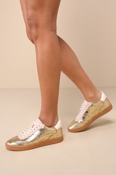 Metallic Sneakers With Perforations And Round Toe, Gold Leather Sneakers With Gum Sole, Metallic Sneakers With Perforations, Trendy Metallic Round Toe Sneakers, Sporty Low-top Metallic Leather Sneakers, Sporty Metallic Leather Sneakers, Casual Metallic Leather Sneakers, Casual Metallic Sneakers, Metallic Sneakers With Perforated Toe Box