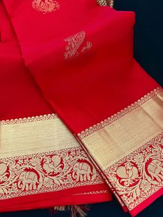 SILK MARK CERTIFIED !!! Gorgeous Chili Red Color Pure Kanjivaram Kanchipuram Handwoven Pure Silk Saree with Gold Zari Weave. Saree has Peacock Motifs on the body, Elephant and Peacock Motifs on the Border. Item : SareeBase Fabric : Pure Kanjivaram Silk Color : Chili Red with Gold Zari WeaveBlouse piece : Comes with un-stitched Blouse piece.Blouse material : Pure Kanjivaram Silk Work : Heirloom Fall & Edging(Yes/No) : YesSilk Mark Certificate given with the Saree(Yes/No) : Yes Disclaimer :-- Colo Red Silk Saree Kanchipuram, Red Silk Saree, Peacock Motifs, Saree Kanchipuram, Silk Saree Kanchipuram, Chili Red, Kanjivaram Silk Saree, Bandhani Saree, Saree Silk