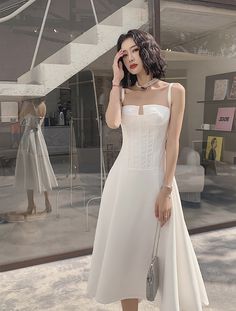 Spaghetti strap dress, white party dresses, high grade evening gownsMaterial:blendedColor:as picture or custom colorNeckline:spaghetti strapBack details:backlessStyle:simpleDress type:A-line&ltp&gtFeatures:simple</p>&ltbr/>&ltp&gtCustomized service and Rush order are available.</p>&ltbr/>&ltp&gtThis dress could be custom made, there are no extra cost to do custom size and color.</p>&ltbr/>&ltp&gtPlease leave your phone number Summer Prom Evening Dress With Lined Bodice, Summer Prom Evening Dress With Corset Back, White Strapless Dress For Bridesmaid During Prom Season, White Spaghetti Strap Dress For Banquet, Summer Evening Dress With Corset Back And Fitted Bodice, White Party Dresses With Adjustable Straps, Elegant Spaghetti Strap Dress For Banquet, Fitted White Dress With Delicate Straps, White Fitted Dress With Delicate Straps