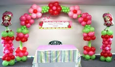 a birthday party with balloons and decorations