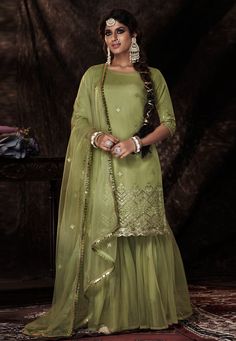 Buy Indian Party wedding wear salwar Pista green soft net sequence sharara suit 14004 online in USA, UK and Canada from KollyBollyEthnics.com Designer Sharara Suits, Gharara Suits, Sharara Suits, Lehenga Gown, Salwar Kameez Online, Sharara Suit, Sharara Set, Net Dupatta, Pakistani Suits