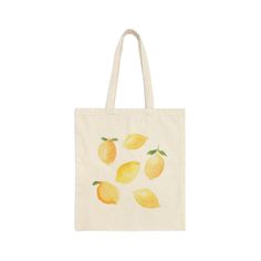 This 100% cotton bag is perfect for everyday wear! While the canvas material will show off your designs in great colors, it's durable and will last for years. The bag features 20" handles (made from the same canvas), making it easy to carry even with a week's worth of shopping. - 15" x 16" - 100% cotton canvas - Heavy fabric (12 oz/yd² (406.9 g/m - Sewn-in label Summer Canvas Bag With Large Capacity, Summer Large Capacity Cotton Canvas Bag, Large Capacity Cotton Tote Canvas Bag, Large Capacity Cotton Canvas Tote Bag, Casual Cotton Canvas Tote Bag, Eco-friendly Cotton Tote Beach Bag, Cotton Canvas Bag For Daily Use In Summer, Trendy Cotton Beach Bag For Everyday Use, Large Capacity Cotton Tote Beach Bag