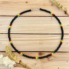 Rasta Style Beaded Choker Colorful Necklace Beach Choker | Etsy Black Beaded Necklaces For The Beach, Colorful Beaded Necklaces For Vacation With Round Beads, Colorful Beaded Necklaces With Round Beads For Vacation, Black Necklaces With Colorful Beads For Beach, Colorful Adjustable Casual Beads, Black Wooden Beads For Beach, Black Wooden Beads Necklace For Beach, Multicolor Large Beads Necklace For Vacation, Multicolor Large Beaded Necklaces For Vacation