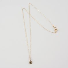 Keep it simple with the DELIA Tiny Flower Pendant Necklace. Small but with a lot of style, accentuate your look with its distinguished elegance. It grabs the attention not just by its shape but also by its charming 14K gold color. This necklace gives you all the reasons to make it a pick of the day. Features: Comfortable Lightweight Elegant and minimal High quality Hand-carved flower-shaped pendant Size & Material: Length: 17" inches Material: 14K gold chain and pendant with an inset of a diamon Everyday 14k Gold Necklaces With Flower Charm, Everyday 14k Gold Necklace With Flower Charm, Delicate Necklace With Flower Charm And Round Pendant, Yellow Gold Charm Necklaces With Flower Charm, Classic Gold Jewelry With Flower Charm, 14k Rose Gold Filled Necklace With Flower Charm, 14k Gold Flower Pendant Charm Necklace, Minimalist Necklace With Flower Charm For Everyday, Dainty 16 Inch Yellow Gold Necklace