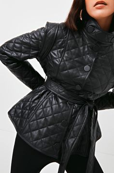 Women's Quilted Leather Jacket In Black Outer Shell: Real Leather Leather Type: Lambskin Leather Finish: Semi-aniline Inner Shell: Viscose Lining Features: Belted Waist & Quilted Closure Style: Buttons Collar Style: Band With Button Cuffs Style: Button Inside Pockets: One Color: Black Luxury Black Quilted Jacket For Winter, Black Blazer With Padded Collar For Work, Luxury Black Quilted Outerwear, Black Leather Outerwear With Padded Collar, Black Quilted Leather Jacket For Winter, Luxury Black Quilted Jacket, Fall Black Blazer With Padded Collar, Black Fall Blazer With Padded Collar, Black Blazer With Padded Collar For Fall