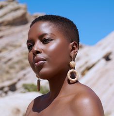 Elevate your boho chic style with these stunning natural hemp hoop dangle earrings. Measuring approximately 3.5 inches (8.9 cm) in length, these earrings are meticulously handcrafted with earthy brown and khaki-colored hemp, accented by 4mm tigers eye gemstones. The elegant gold plated leverback closures add a touch of glamour to these rustic and nature-inspired earrings.Materials:Natural Hemp: These earrings feature natural hemp cord in earthy brown and khaki hues, adding a touch of rustic char