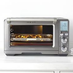 a toaster oven sitting on top of a counter