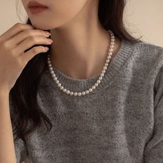 Indulge in luxury with our Natural Mabe Pearl Double Layered Necklace. This sophisticated piece is the perfect gift for her, combining elegance and beauty. The natural pearl adds a touch of exclusivity, making this necklace a truly unique and timeless addition to any collection. Material: 18K White Gold Plated Copper Stone: Cubic ZirconiaPearl: Mabe PearlNecklace 1: 6mm 17 Inch Round PearlNecklace 2: 8mm 17 Inch Round PearlThis necklace is made of 6mm and 8mm , which are strung on a silk thread. The pearls are a classic white color and have a high luster.Introducing our exquisite collection of high-end faux pearl necklaces, a perfect blend of sophistication and versatility. A clasp adorned with an infinity symbol, allowing you to wear the two necklaces together for a bold statement or sepa Akoya Pearl Beaded Necklace With Pearl Charm, Beaded Akoya Pearl Necklace With Pearl Charm, Elegant Baroque Pearl Necklace With Round Beads, Elegant Single Strand Necklace, Elegant Long Single Strand Pearl Necklace, Elegant Baroque Pearl Beaded Necklace, Elegant Akoya Pearl Round Bead Necklaces, Elegant Necklace With Pearl Drop And Round Beads, Classic Long Pearl Necklace With Charm