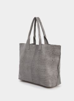 This gray leather tote bag is amazing to carry with style everything you need every day, no matter how many things you carry on. Boost your look with its elegant and timeless design. If you are looking for a unique, large, gorgeous, lightweight, and practical bag, you have already found it!  The Maxi Bag is an exclusive leather shopper bag handmade in our atelier with embossed cow leather + crocodile effect. The crocodile embossed makes the cow leather look like crocodile skin with its beautiful Casual Everyday Bag With Crocodile Pattern, Casual Crocodile Pattern Bag For Everyday Use, Casual Shopping Bags With Crocodile Pattern, Everyday Crocodile Pattern Satchel Bag, Top Handle Shoulder Bag With Crocodile Pattern, Trendy Textured Leather Tote Shoulder Bag, Everyday Crocodile Pattern Shoulder Bag With Top Handle, Everyday Use Top Handle Shoulder Bag With Crocodile Pattern, Rectangular Crocodile Pattern Shoulder Bag For Travel