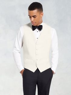 Elegant Formal Vest For Spring, Elegant Semi-formal Spring Vest, Elegant Winter Vest, Classic Fitted Spring Tuxedo, Winter White Fitted Tuxedo, Formal Sleeveless Winter Vest, Formal Winter Sleeveless Vest, White Sleeveless Formal Suit, Classic Sleeveless Spring Suits