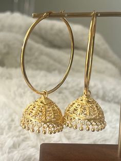 Exotic Bollywood inspired gold plated super light domed jhumkis on jumbo steel hoops.  Antique silver colored dome dangles on 50 mm gold plated hoops Earrings dangles approximately 4 inches long and are super light. Luxury 22k Gold Traditional Chandbalis, Traditional Luxury Gold Chandbalis, Temple Jewelry Round Hoop Earrings For Celebration, Temple Jewelry Style Round Hoop Earrings For Celebration, Bollywood Style Hoop Earrings As Gift, Bollywood Style Round Hoop Earrings As Gift, Bollywood Style Round Hoop Earrings For Gift, Elegant Gold Hoop Chandbalis, Festive Hoop Earrings