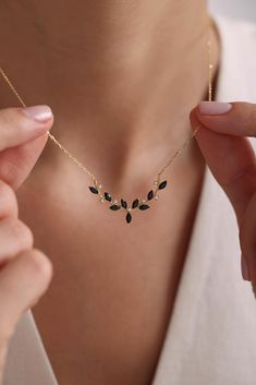 925 Sterling Silver Gold Plated Elegant Ivy Necklace with Shuttle Stone , Chain Necklace , Stones Necklace , Gift for Mom , Gift Christmas Metal Used: 925 Sterling Silver;  Weight: 2.00 Gr;  Figure Width: 3.40 Cm;  Figure Height: 1.00 Cm;  Chain Length: 42 Cm;  Stone Type: Zircon;  Plating: Gold Plated;  Maintenance: It does not darken as long as contact with substances such as Perfume, Alcohol, Cream, Bleach is avoided. ;  Packaging: All Products Are Sent in a Gift Box. ; Personalized Necklace Product Description Discover the elegance and sentimentality of our personalized necklaces, designed to keep your cherished memories close to your heart. These unique pieces of jewelry are perfect for expressing your individuality and making a statement. Here's why our personalized necklaces stand o Ivy Necklace, Black Stone Jewelry, Necklace Stones, Christmas Metal, Stones Necklace, Necklace Stand, Black Stone, Personalized Necklace, Necklace Gift