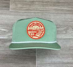 Custom made with a rad park patch & a retro poly rope hat  Taller profile, but fits most heads well up to size 7-5/8 *This is a medium profile (slightly taller) hat that will fit good on medium-large heads *Please feel free to ask questions about the fit; we don't mind at all! *Each listing includes 1 patch, 1 hat & a production fee for us to make the hat for you.   If this hat/patch isn't your style, then check out the 100s of other patches & blanks that we have to create your own wearable masterpiece. Simply pick a patch, pair with the perfect hat and we will do the rest! Vintage Green Adjustable Snapback Hat, Green Vintage Adjustable Snapback Hat, Green Adjustable Vintage Snapback Hat, Vintage Green Snapback Hat For Outdoor, Vintage Trucker Hat For Outdoor Activities, Camping Hat With Logo Patch And Curved Brim, Green Vintage Trucker Hat For Outdoor, Camping Hat With Curved Brim And Logo Patch, Green Trucker Hat With Flat Brim For Camping