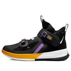 The Nike LeBron Soldier 13 EP 'Lakers' is a bold and stylish sneaker that is perfect for any activity. It features a traditional Magic Strap design, a daring color-blocking design, and James' personal logo on the upper. The black and white-university gold colorway is inspired by the Lakers, James' team. The rubber sole ensures durability and comfort, making it perfect for any activity. Whether you're playing basketball or just running errands, the Nike LeBron Soldier 13 EP 'Lakers' is the perfect sneaker. (SNKR/Men's/High Top/Basketball/Lebron James/Gift Recommend) Sporty Nike High-top Sneakers With Contrast Sole, Modern Jordan Sports Shoes With Contrast Sole, Nike High-top Sneakers For Sports With Contrast Sole, Nike Sneakers For Light Sports With Contrast Sole, Nike Sneakers With Contrast Sole For Light Sports, High-top Jordan Shoes With Contrast Sole For Sports, Nike High-top Running Sneakers With Rubber Sole, Nike Running Shoes With Contrast Sole, Leather High-top Training Sneakers