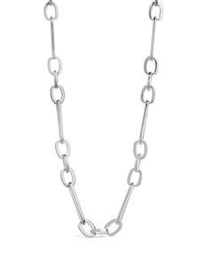 Make a statement and stand out from the crowd with this unique Carmen Chain Necklace. Featuring a mixed link chain with alternating sizes, it's the perfect layering accessory for every occasion. So go ahead, let your style shine! Materials: 14K gold or rhodium plated brass Features: Measures 16" with 2" extender, 0.25" width, Lead & Nickel free, lobster clasp Link Chain Necklace, Pearl Earrings Dangle, Sterling Silver Hoops, Chain Link Necklace, Link Necklace, Silver Hoops, Initial Necklace, Link Chain, Heart Necklace