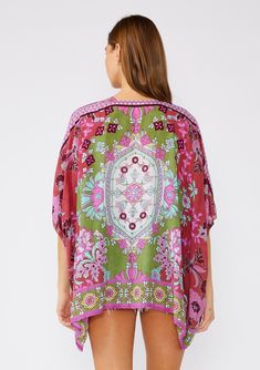 An ultra-bohemian kimono top in a stunning green and pink floral print. Floral print with contrast border Relaxed fit Half-length kimono sleeve Open front Bohemian style cover-up A must-pack style for the beach or your next vacation. Our lightweight kimono top is designed in a gorgeous mixed floral print. With an easy open front and half-length sleeves. Throw it on over your swimsuit for a quick cover-up, or style it over jeans shorts and a tank top for an effortlessly bohemian vibe. ﻿ Model is Sundance Clothing, Bohemian Kimono, Floral Print Kimono, Print Kimonos, Pink Floral Print, Surfs Up, Green Rose, Green And Pink, Kimono Sleeve